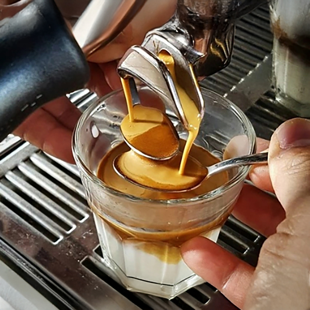 Undertow espresso being poured at Society Coffee